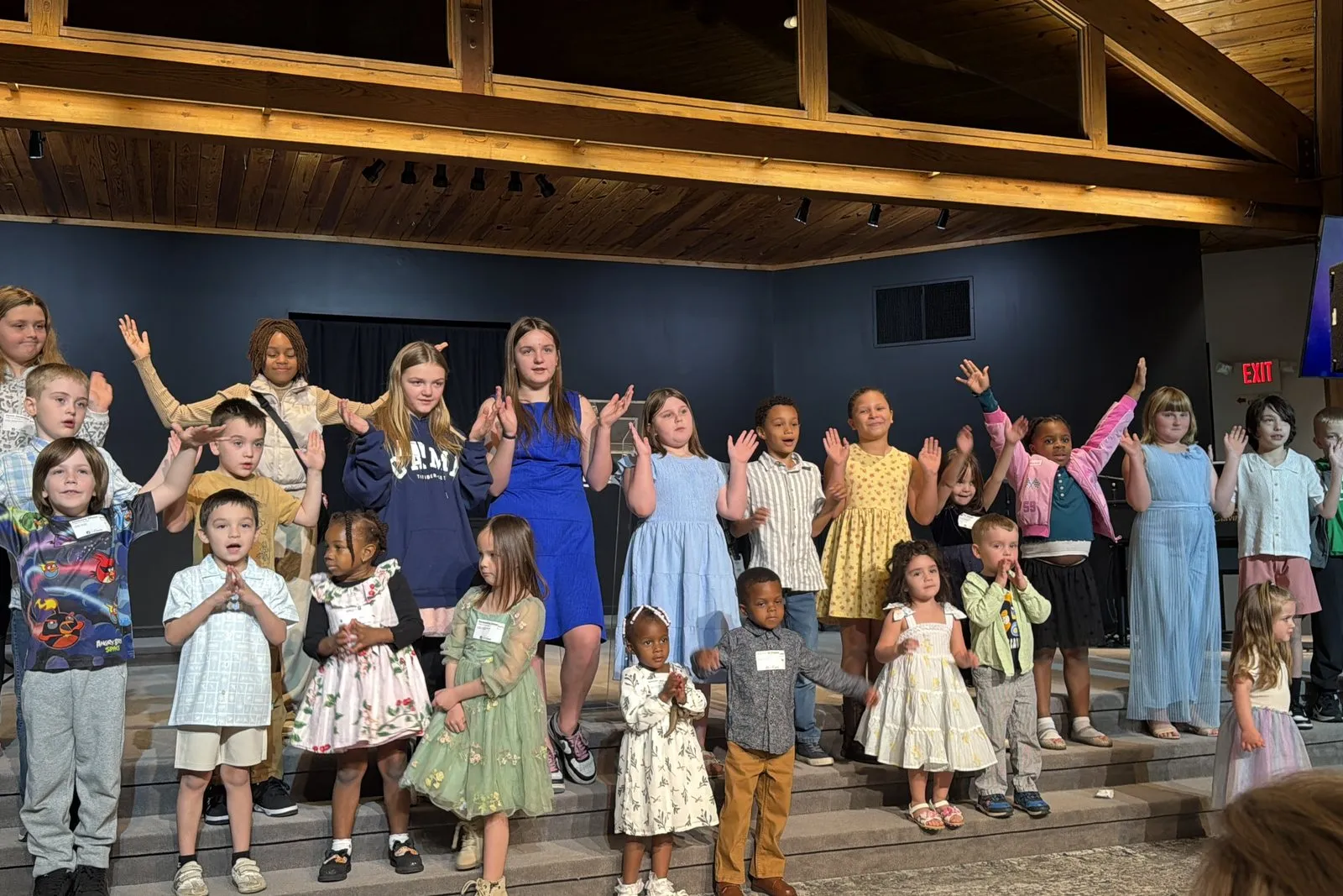 The River Kids group on stage together on a Sunday morning